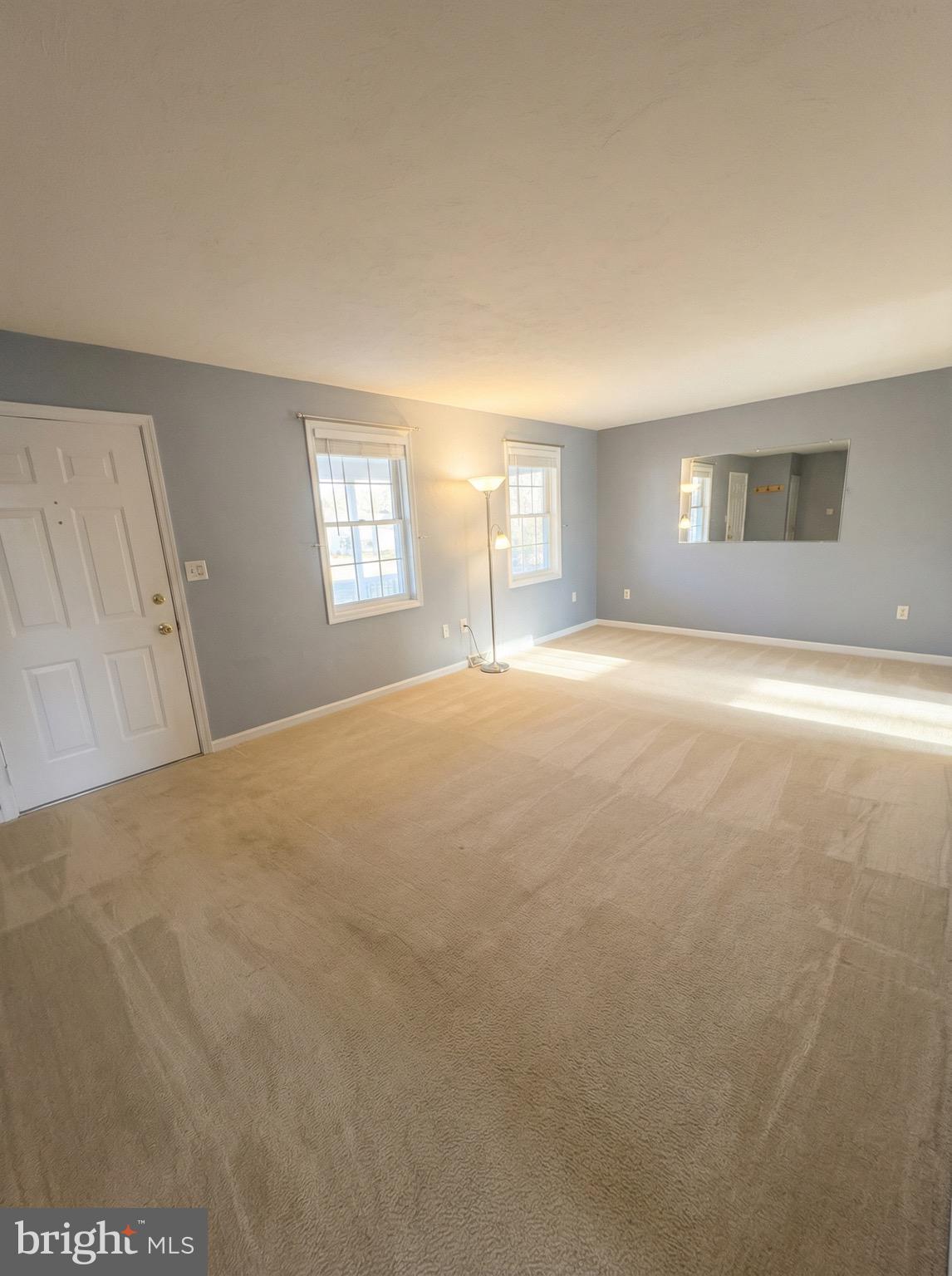 970 Haines Road York, PA 17402 - Photo 10 of 20 a view of an empty room with window and wooden floor