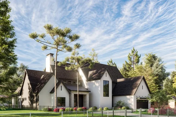 a front view of a house with yard