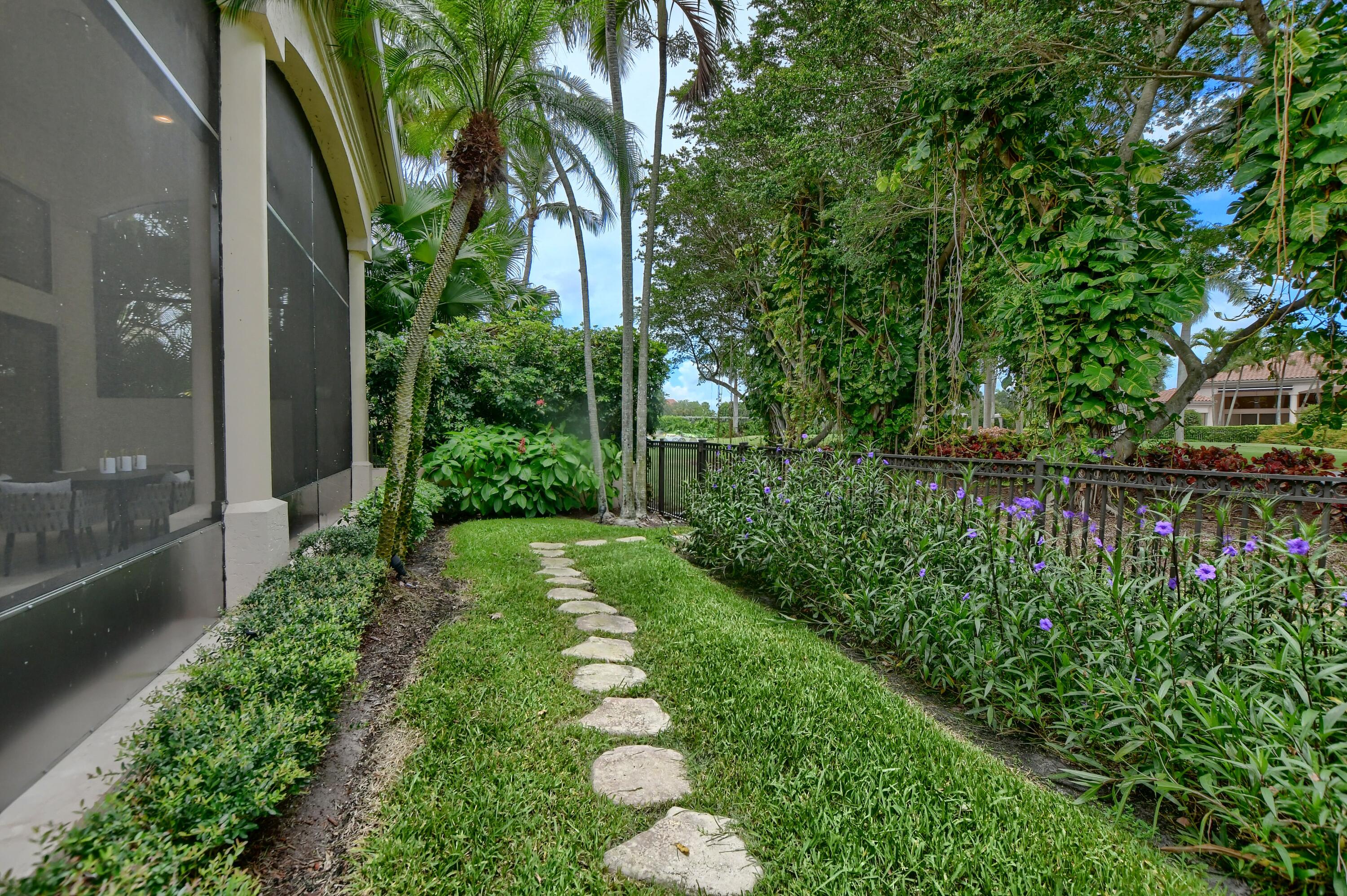 5894 Northwest 25th Court Boca Raton, FL 33496 - Photo 13 of 46 grassy pathway