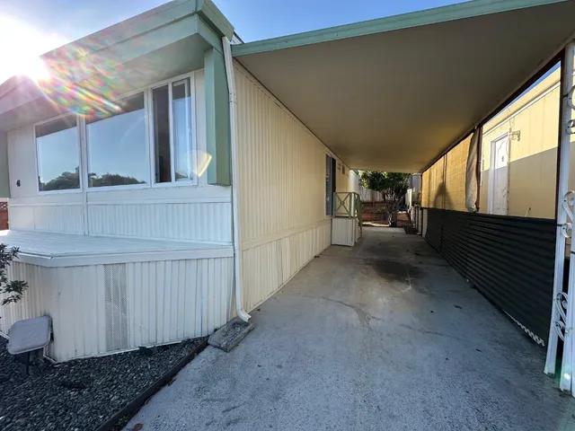 a view of balcony and yard
