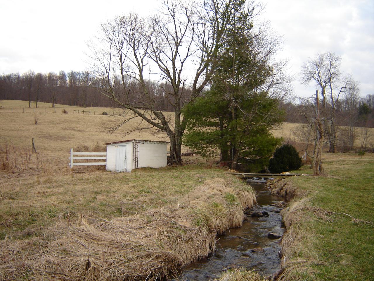 367 Conner Grove Road Southwest Willis, VA 24380 - Photo 13 of 22 a view of a house with a yard