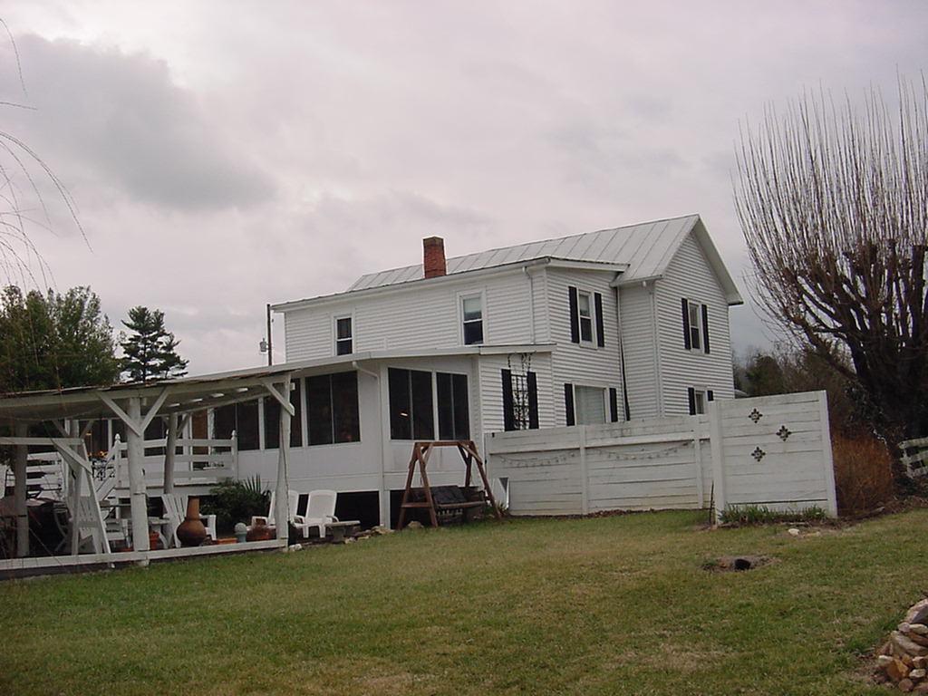 367 Conner Grove Road Southwest Willis, VA 24380 - Photo 3 of 22 a view of a house with a yard