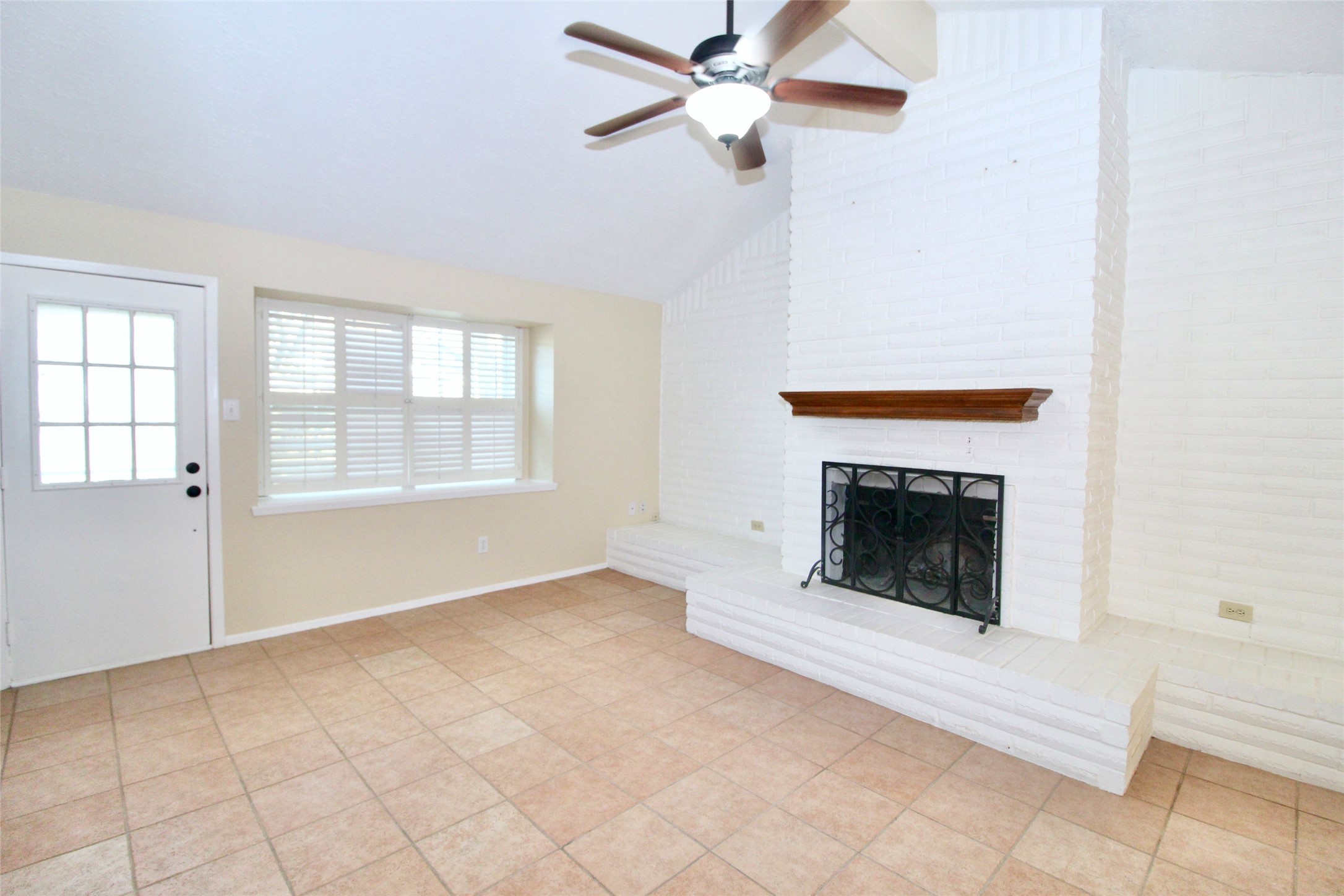 16731 Rippling Mill Drive Sugar Land, TX 77498 - Photo 2 of 15 Spacious living area with cozy fireplace.