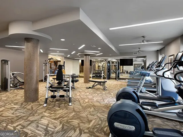 a view of a room with gym equipment