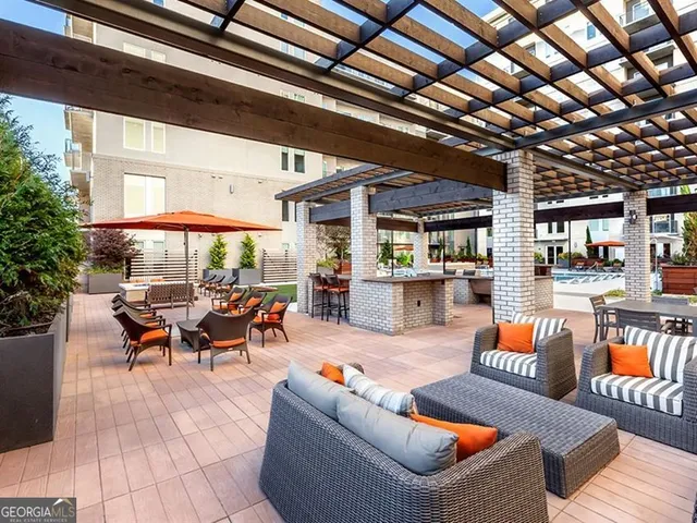 an aerial view of residential houses with outdoor space and street view