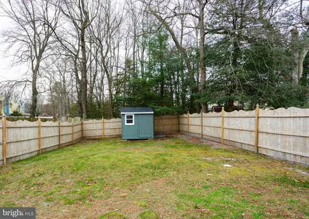 a view of a outdoor space with a fence