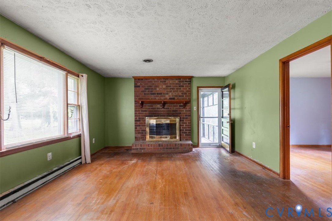 20101 River Road Chesterfield, VA 23838 - Photo 22 of 44 Spacious room featuring wood-finish flooring, a br