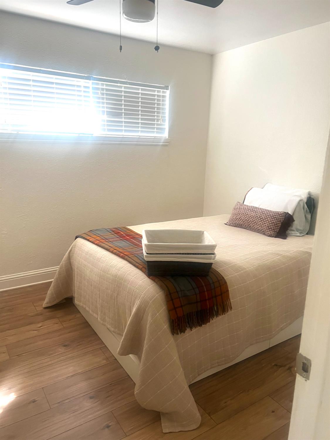5121 Kenneth Avenue Carmichael, CA 95608 - Photo 21 of 38 a bedroom with a bed and a window
