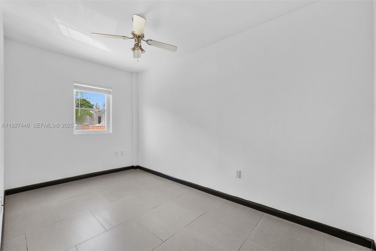 1876 Southwest 11th Terrace, Unit 206 Miami, FL 33135 - Photo 11 of 15 a view of a window in a room