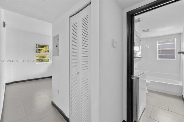 a view of a hallway with front door