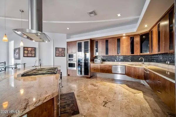 a bedroom with furniture and a fireplace