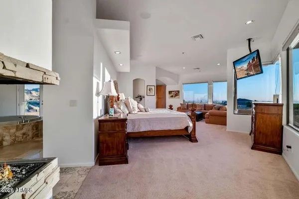 a view of a livingroom with furniture and front door