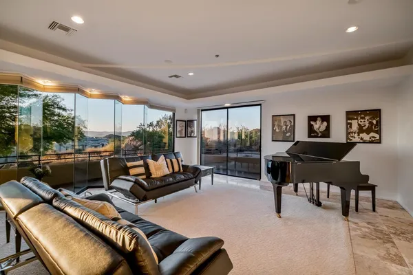 an aerial view of a house with a garden
