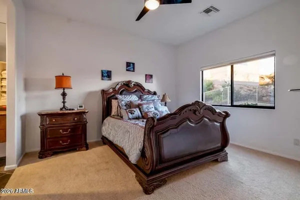 a view of a house with backyard and porch