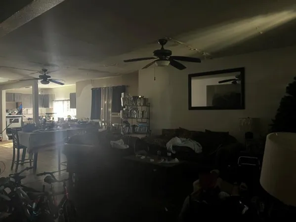 a living room with patio furniture
