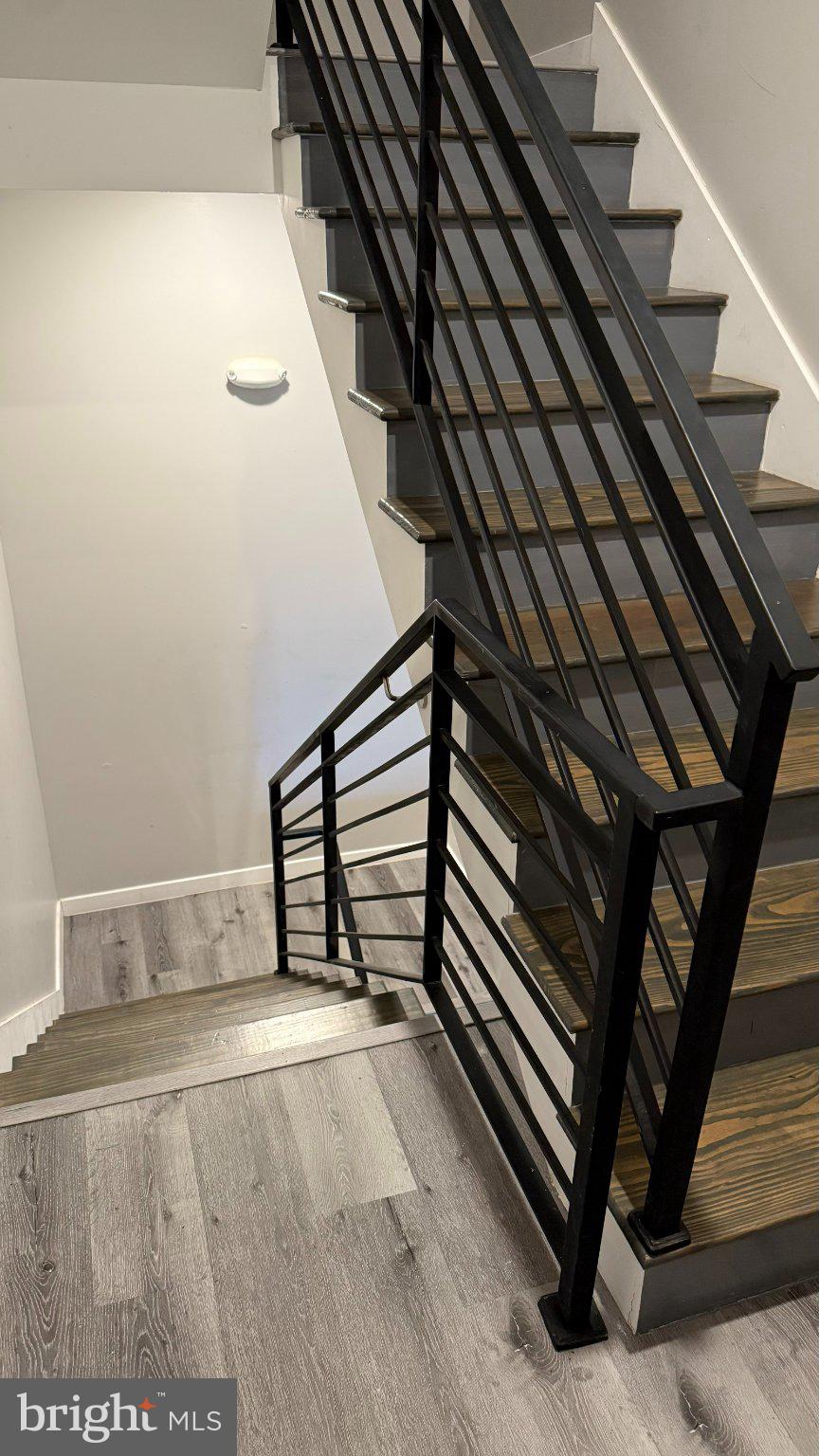 1621 Ridge Avenue Philadelphia, PA 19130 - Photo 13 of 14 Modern staircase with sleek railings.