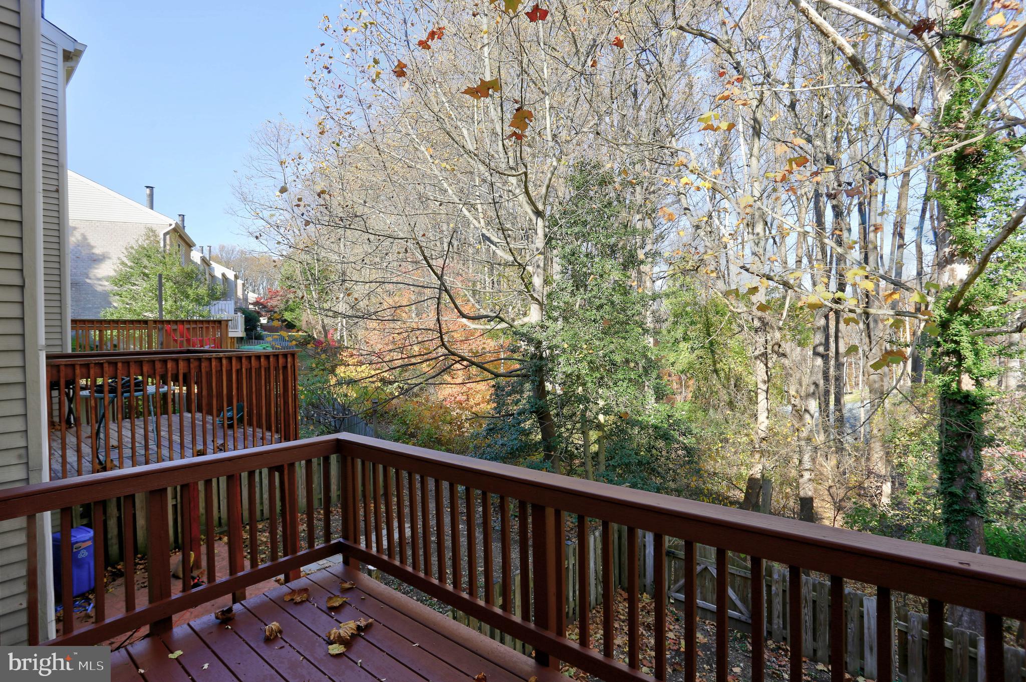 20 Bryans Mill Way Baltimore, MD 21228 - Photo 16 of 36 a view of balcony with wooden floor