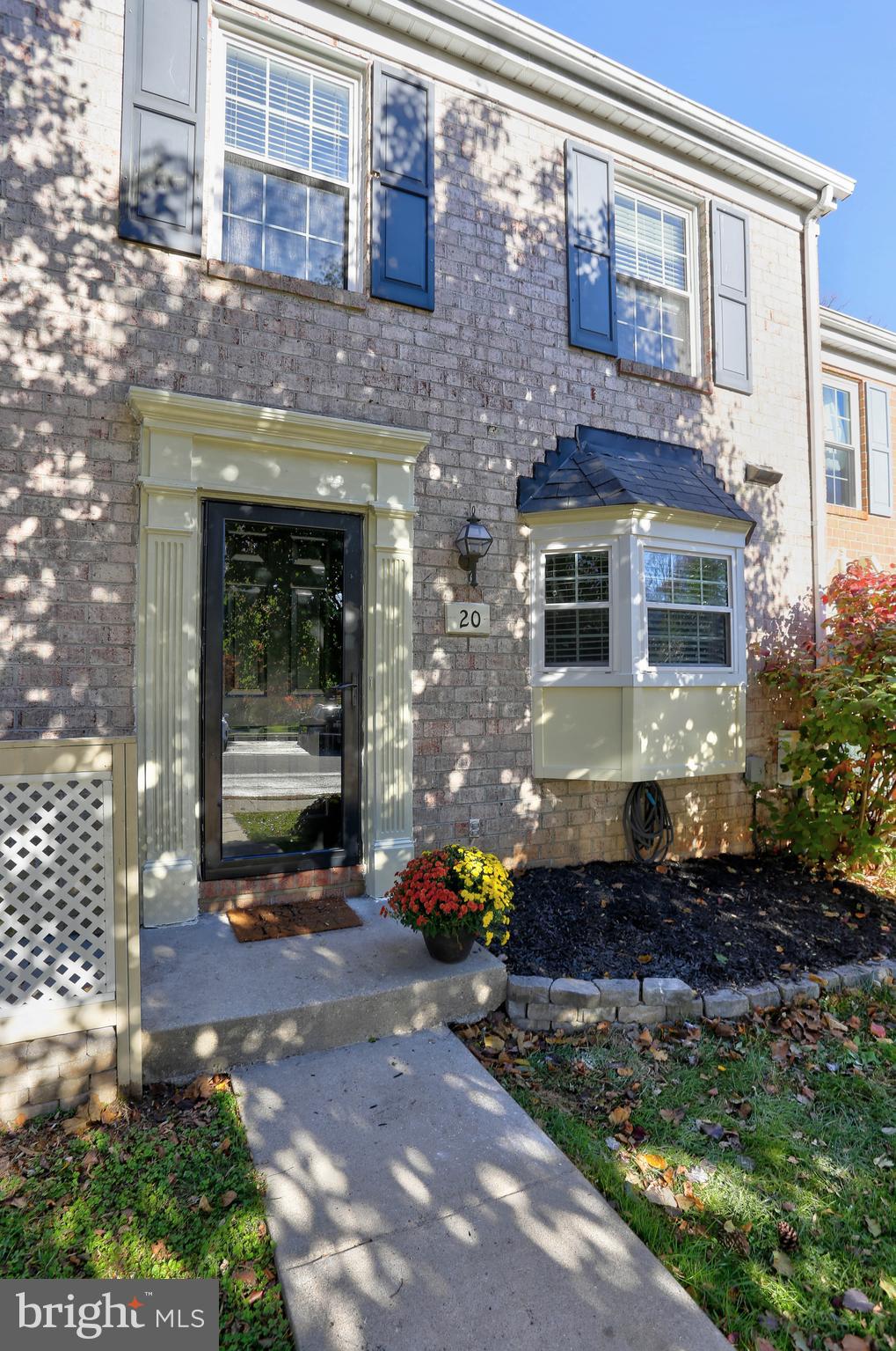 20 Bryans Mill Way Baltimore, MD 21228 - Photo 2 of 36 a front view of a house with a yard
