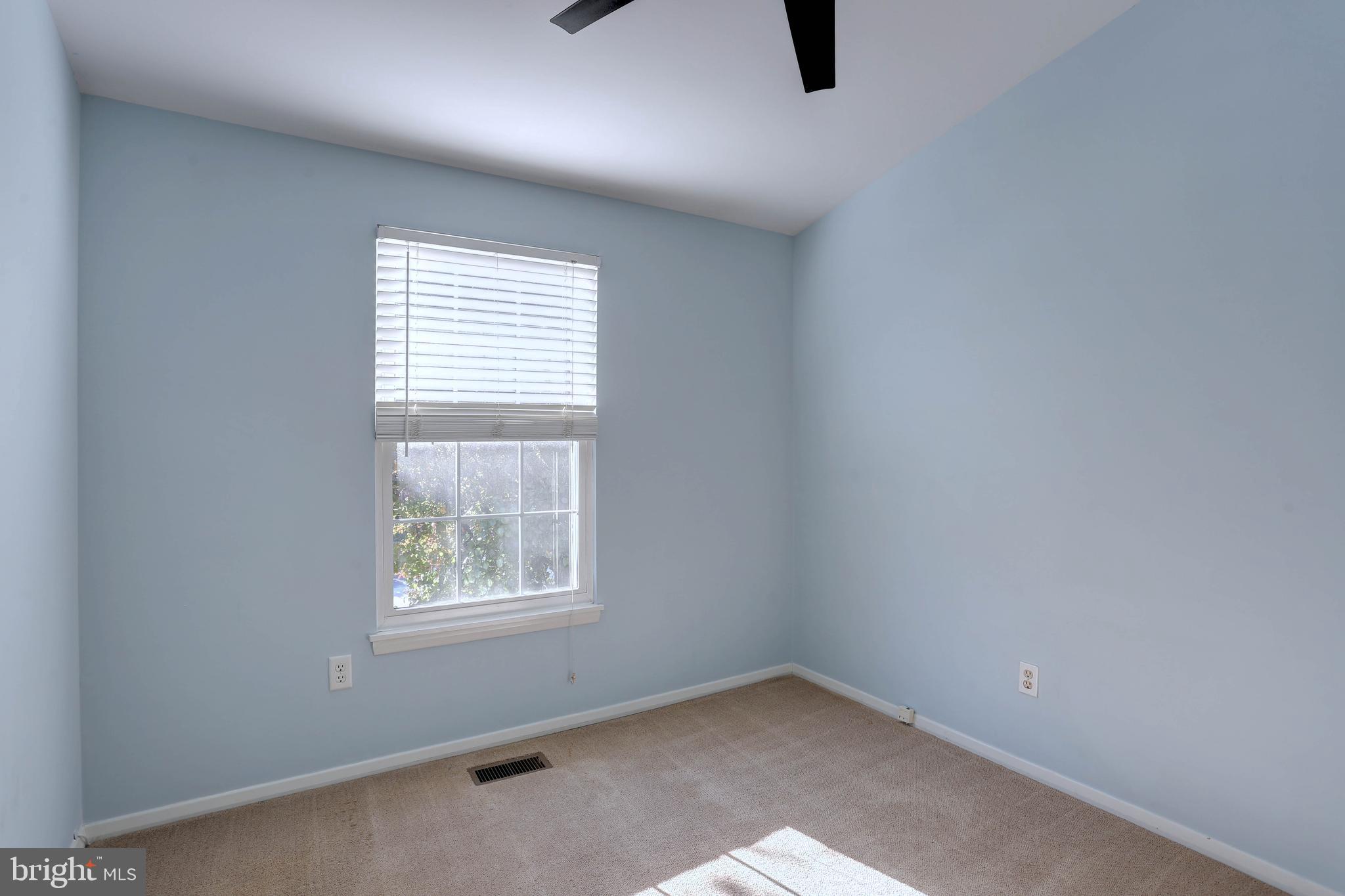 20 Bryans Mill Way Baltimore, MD 21228 - Photo 22 of 36 an empty room with windows