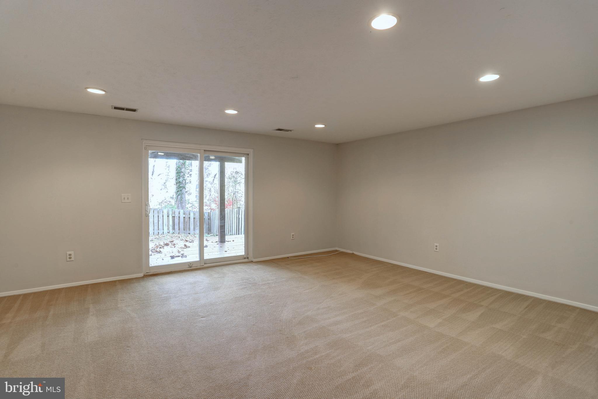 20 Bryans Mill Way Baltimore, MD 21228 - Photo 28 of 36 a view of an empty room with a window