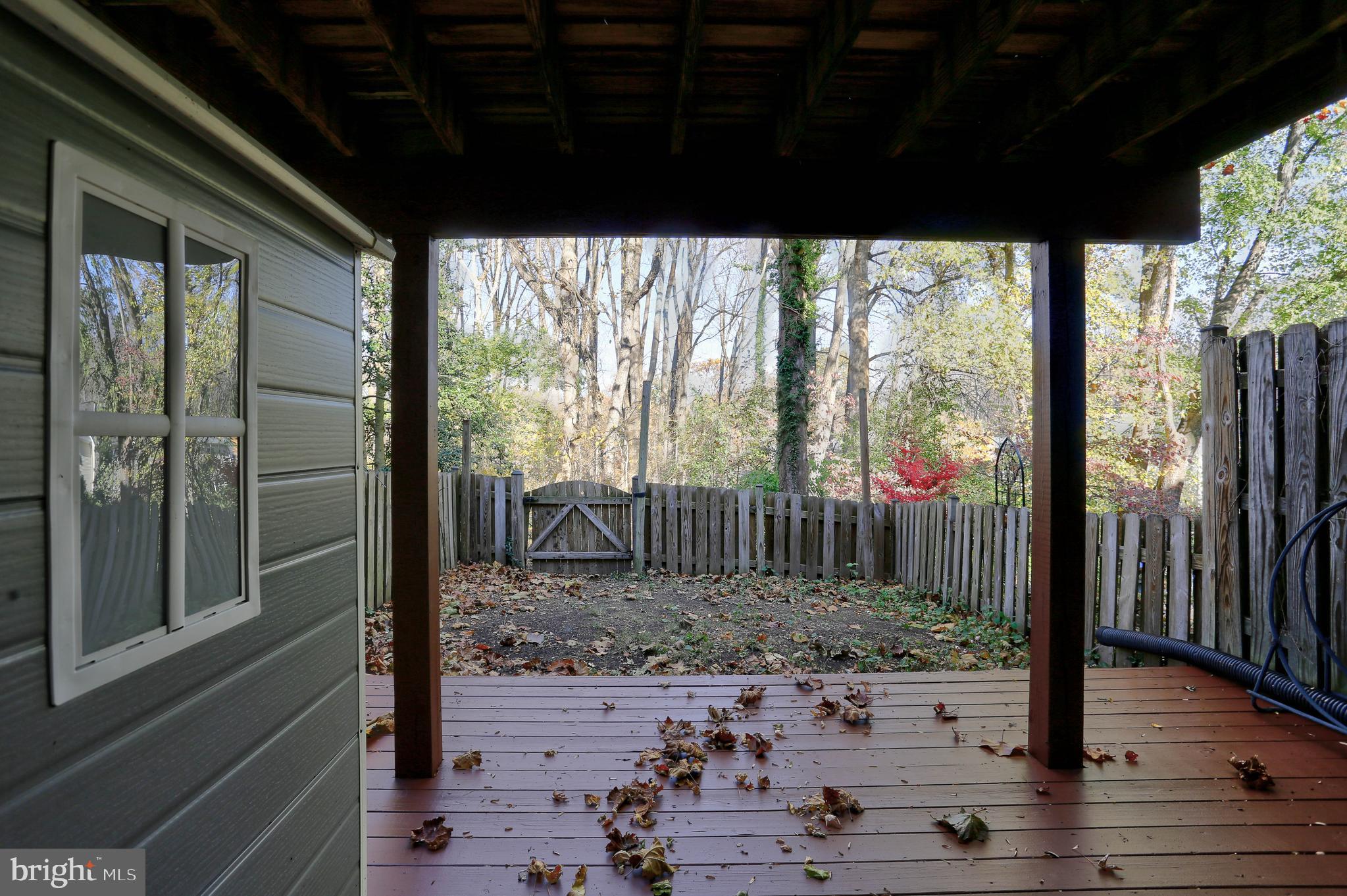 20 Bryans Mill Way Baltimore, MD 21228 - Photo 30 of 36 a view of a room with wooden floor and outdoor space