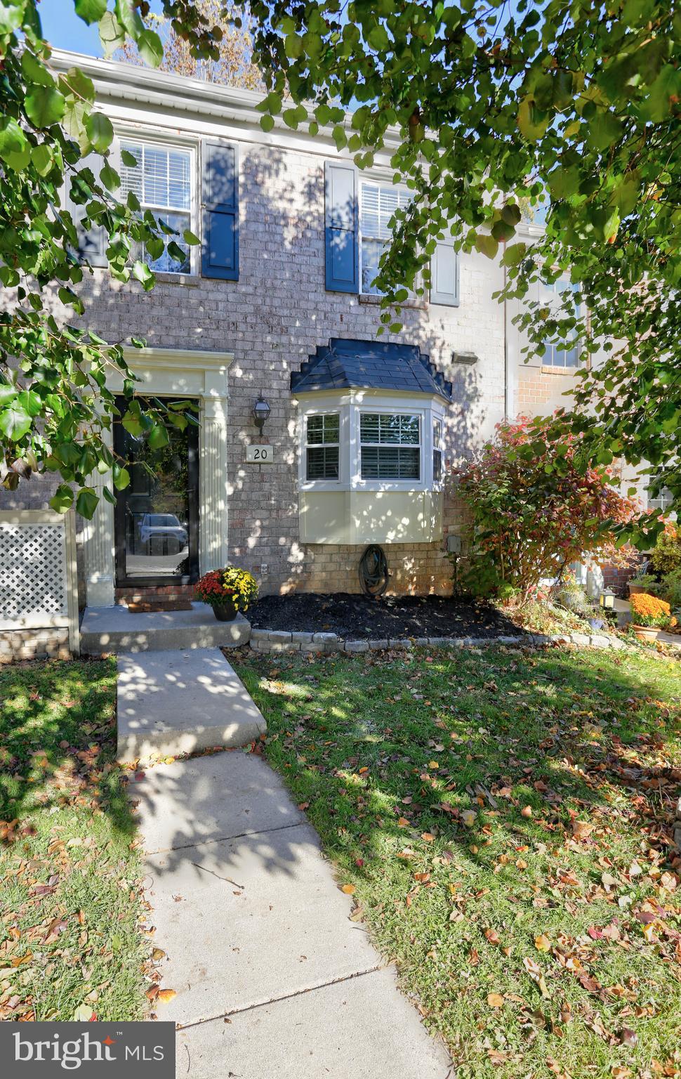 20 Bryans Mill Way Baltimore, MD 21228 - Photo 3 of 36 a front view of a house with a garden