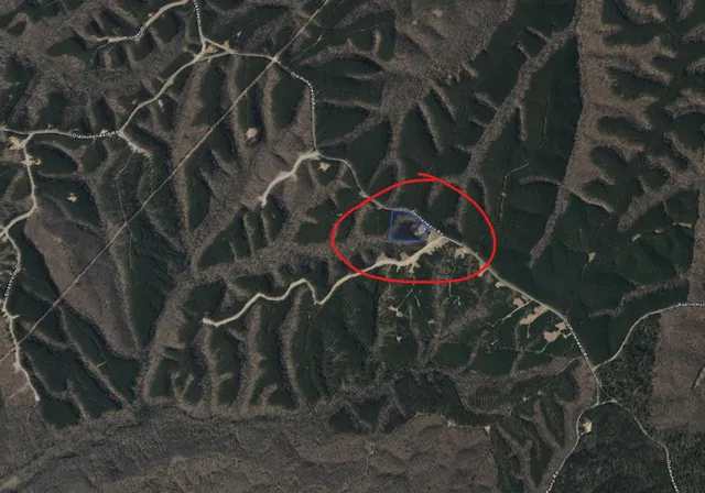 a view of a garage with white wall