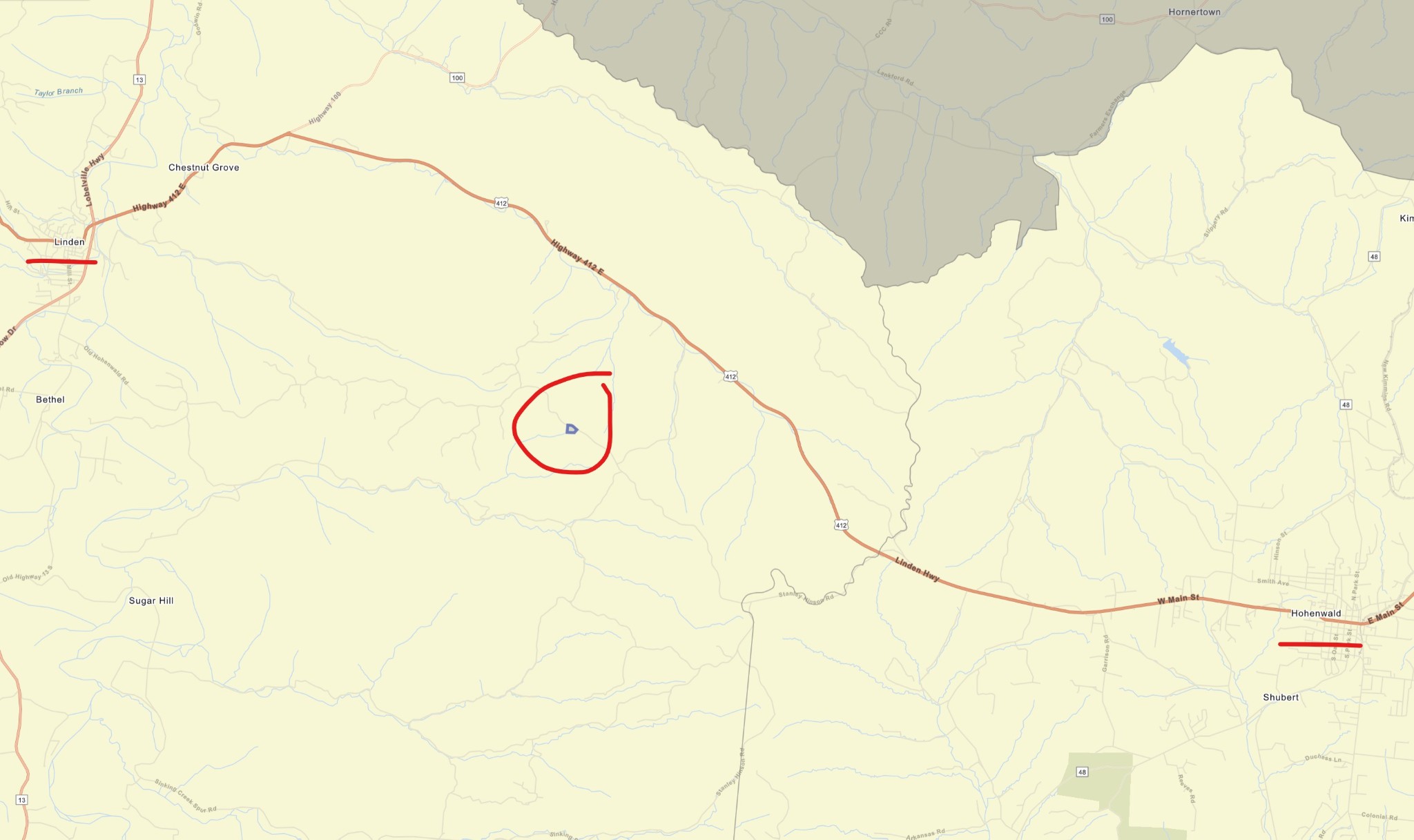 7696 Old Hohenwald Road Linden, TN 37096 - Photo 9 of 16 a view of a garage with white wall