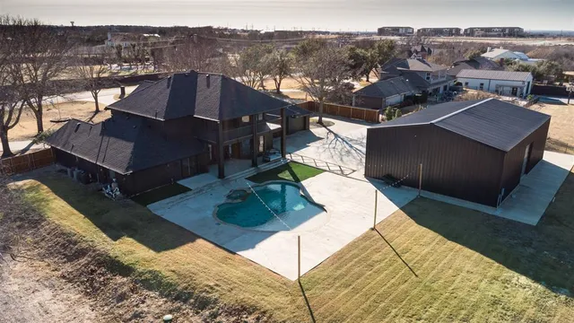 a view of a house with swimming pool