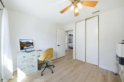 a workspace with furniture and a window