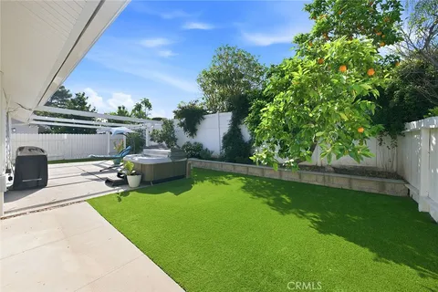 a view of a patio with swimming pool