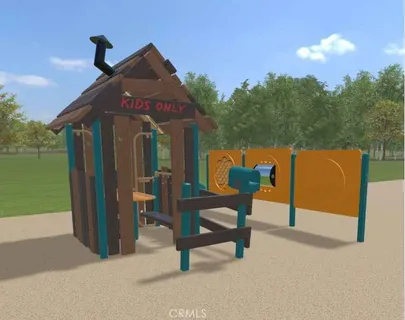 a view of a park with iron fence