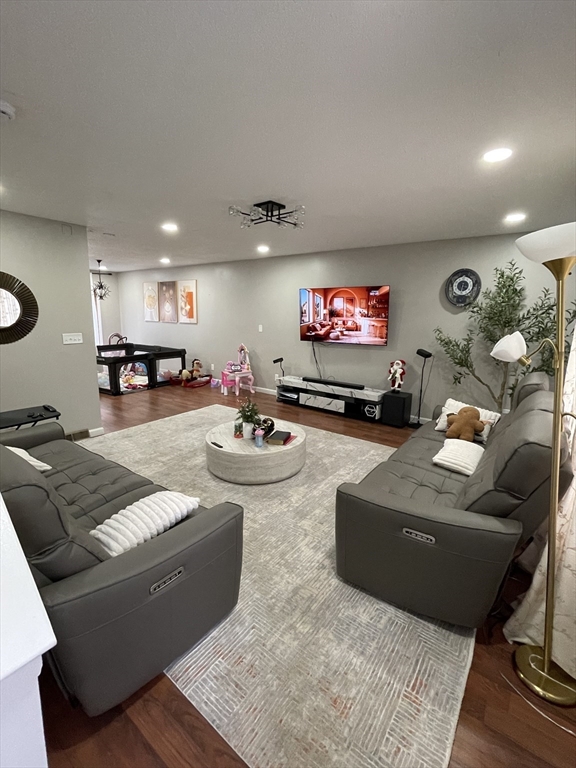 200 Lambert Terrace, Unit 41 Chicopee, MA 01020 - Photo 4 of 24 a living room with furniture and a flat screen tv