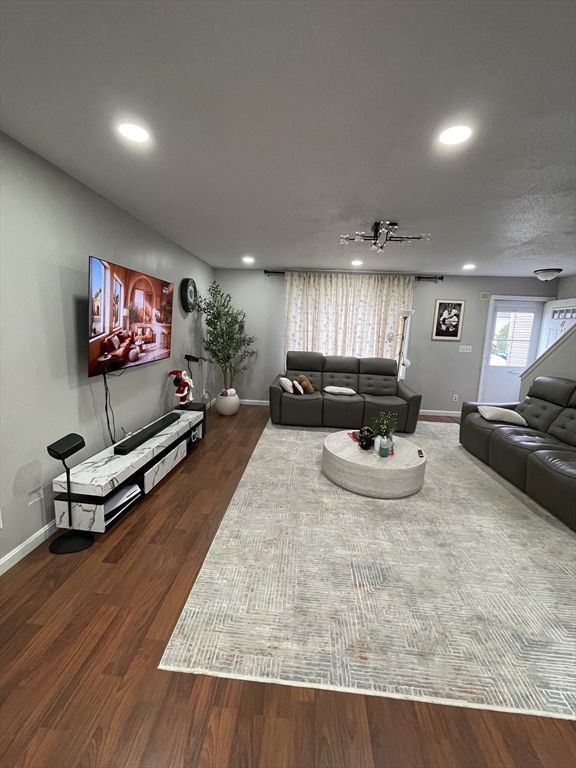 200 Lambert Terrace, Unit 41 Chicopee, MA 01020 - Photo 5 of 24 a living room with furniture and a flat screen tv