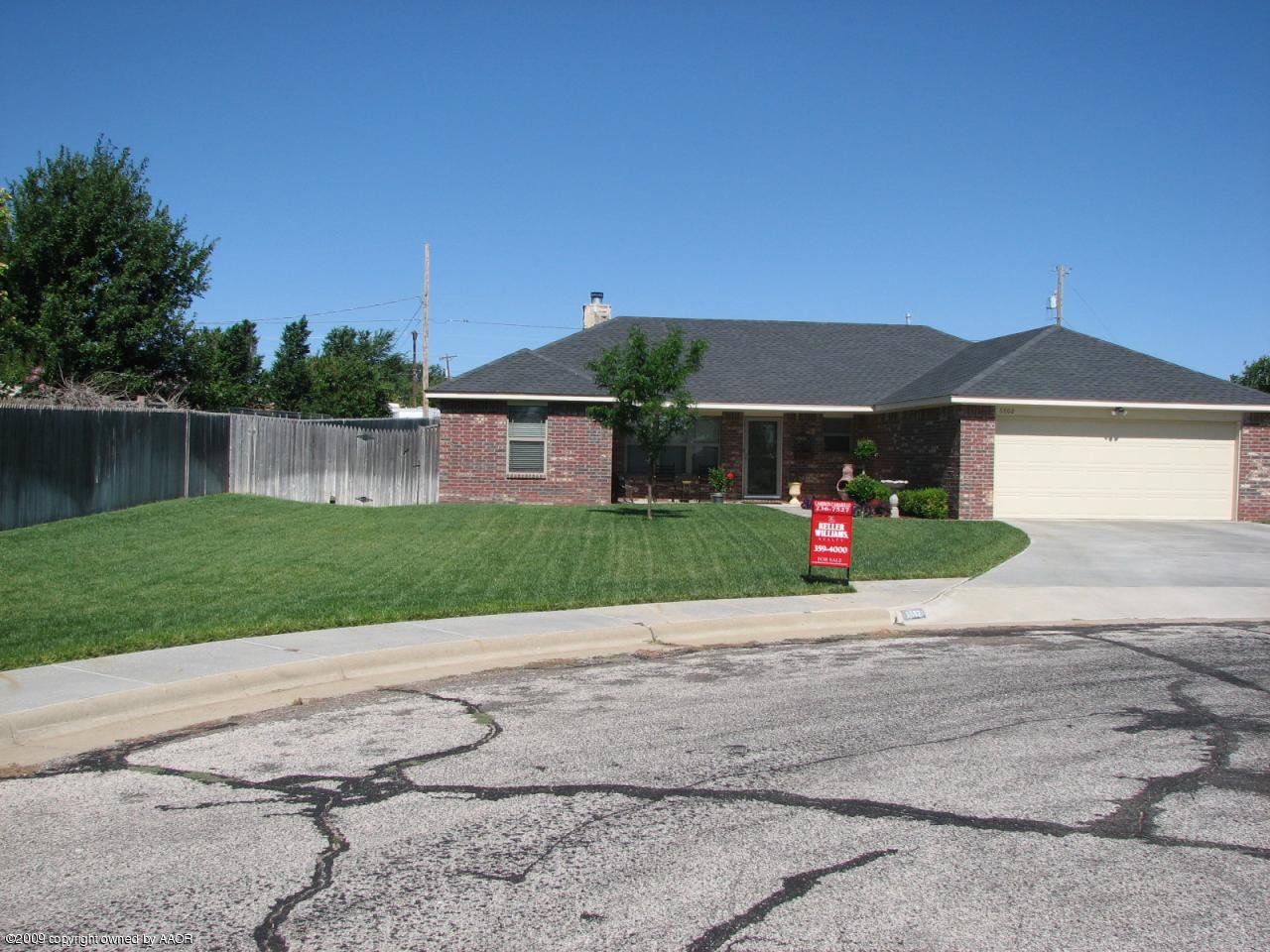 6602 Slater Circle Amarillo, TX 79110 - Photo 25 of 25 a house with yard in front of it