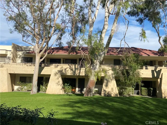 a view of house with yard