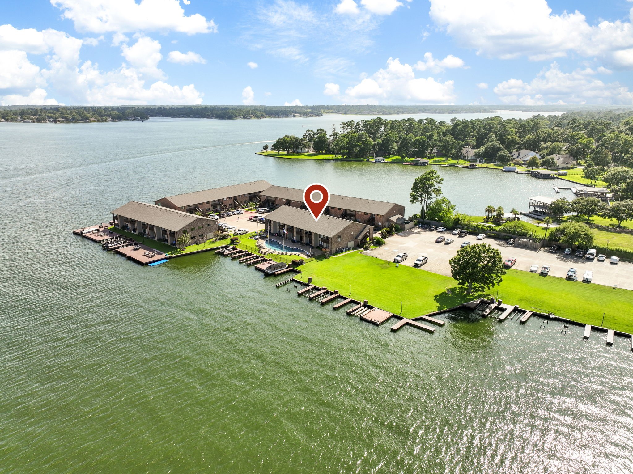 801 River Road, Unit 105C Montgomery, TX 77356 - Photo 1 of 30 Experience lakeside living with panoramic, year-round Lake Conroe views from this move-in ready 1-bedroom condo