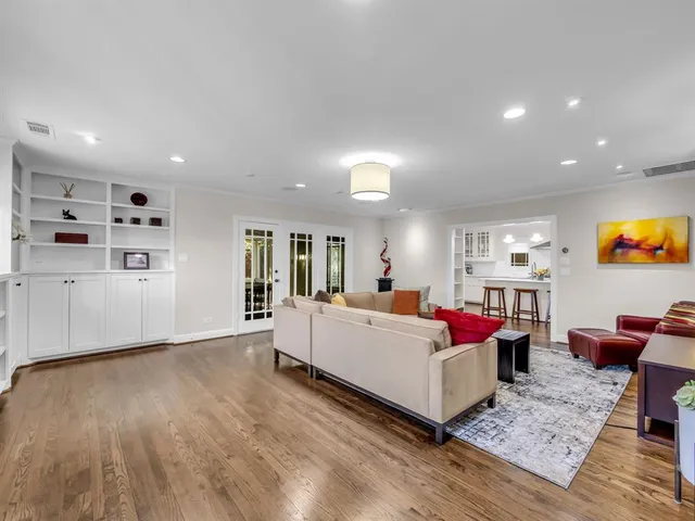 a bed room with furniture and wooden floor