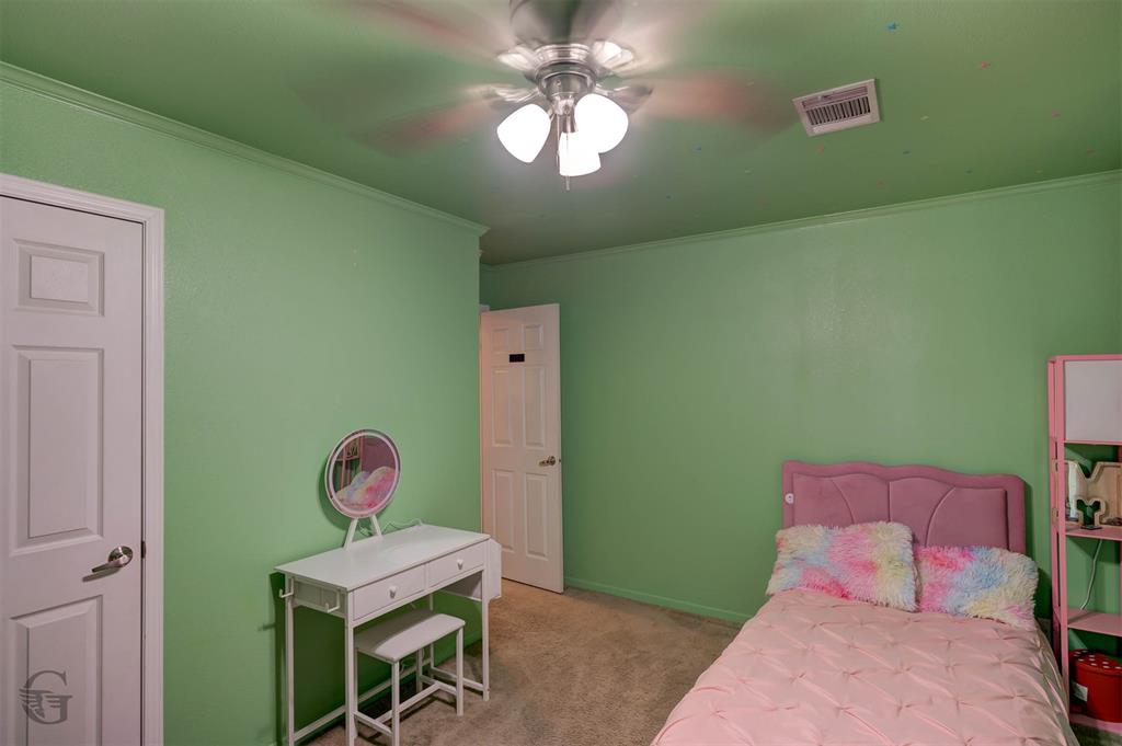 4807 Greenwood Heights Road Greenwood, LA 71033 - Photo 14 of 21 a room with furniture and a window
