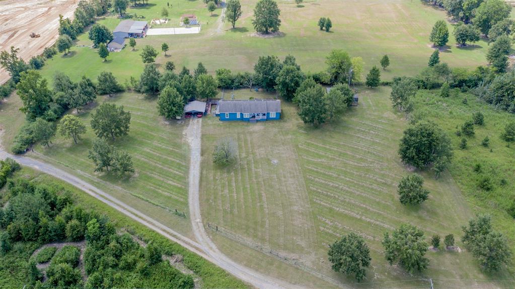 4807 Greenwood Heights Road Greenwood, LA 71033 - Photo 2 of 21 an aerial view of residential house with outdoor space