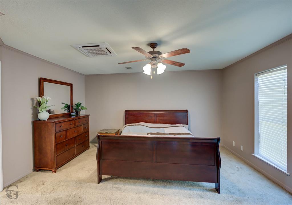 4807 Greenwood Heights Road Greenwood, LA 71033 - Photo 3 of 21 a living room with furniture and a chandelier