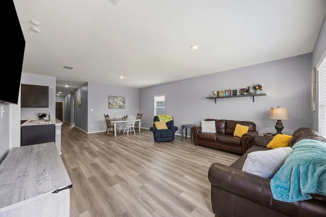 a living room with furniture and a couch