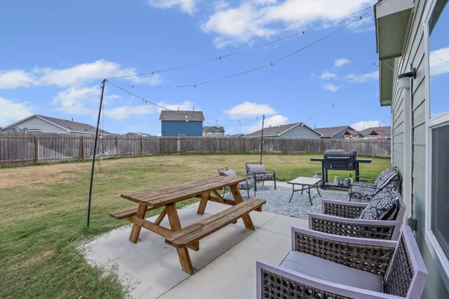 a view of a terrace with chairs