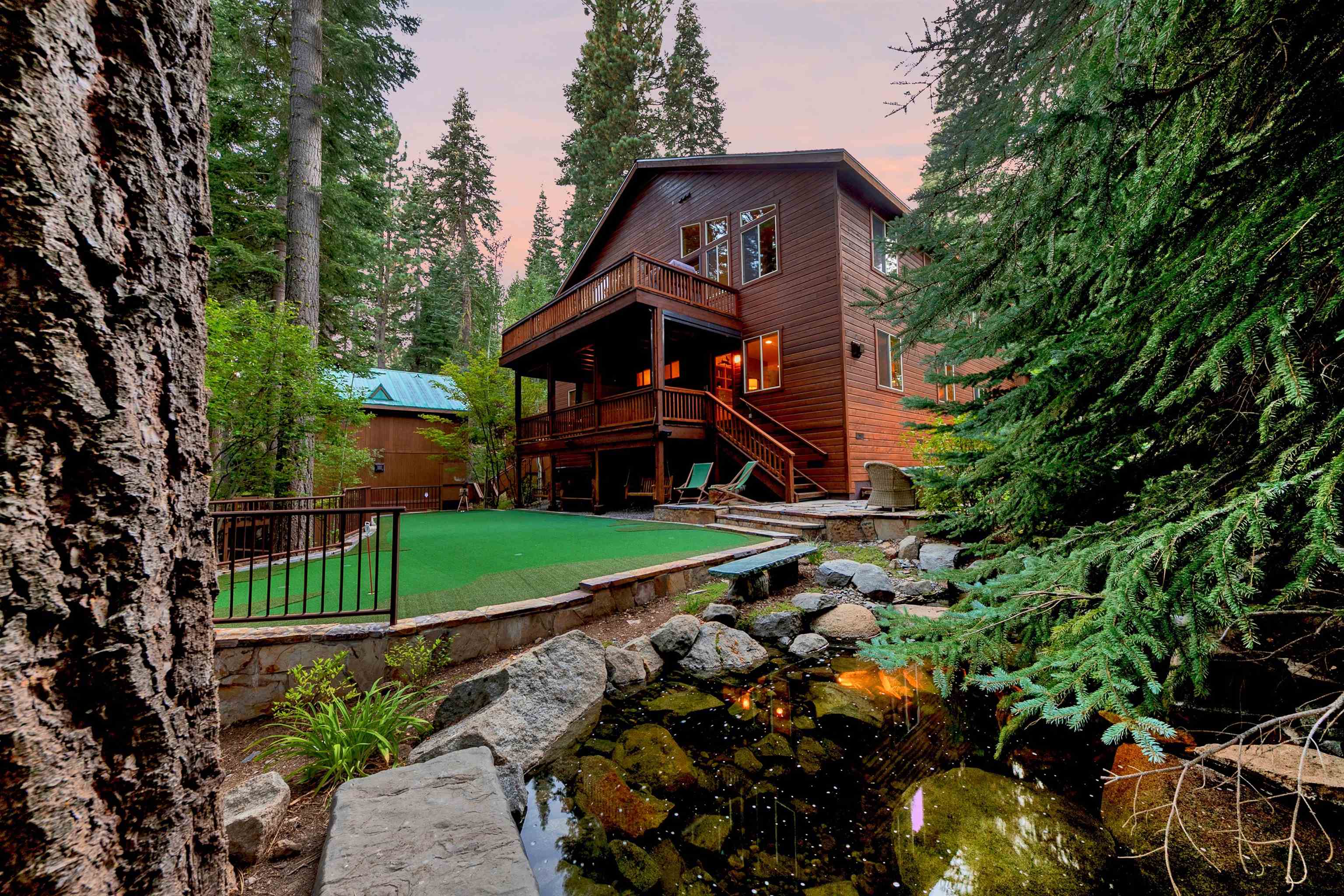 11781 Chamonix Road Truckee, CA 96161 - Photo 25 of 28 a front view of a house with a yard