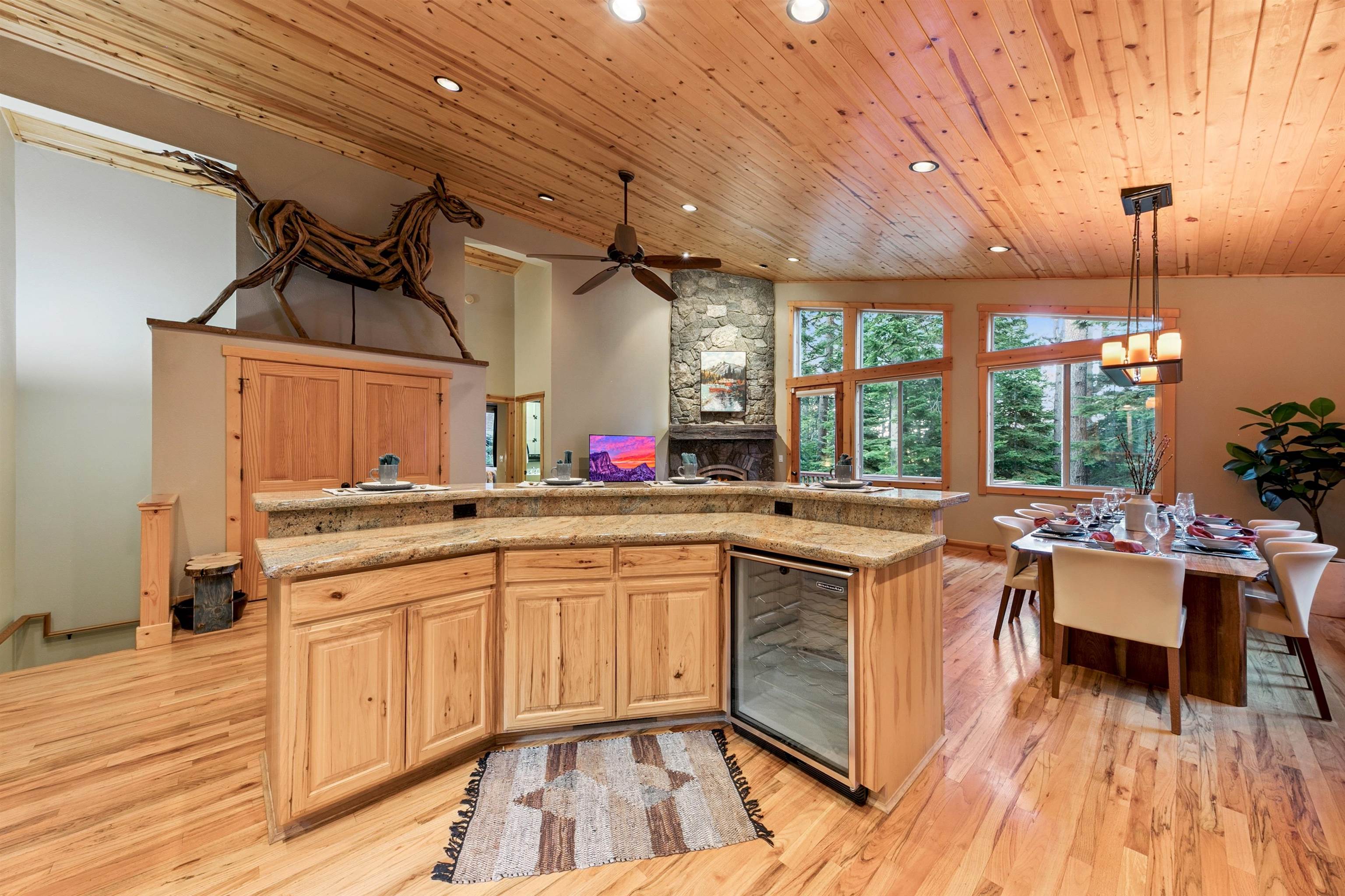11781 Chamonix Road Truckee, CA 96161 - Photo 8 of 28 a kitchen with lots of counter top space and dining table