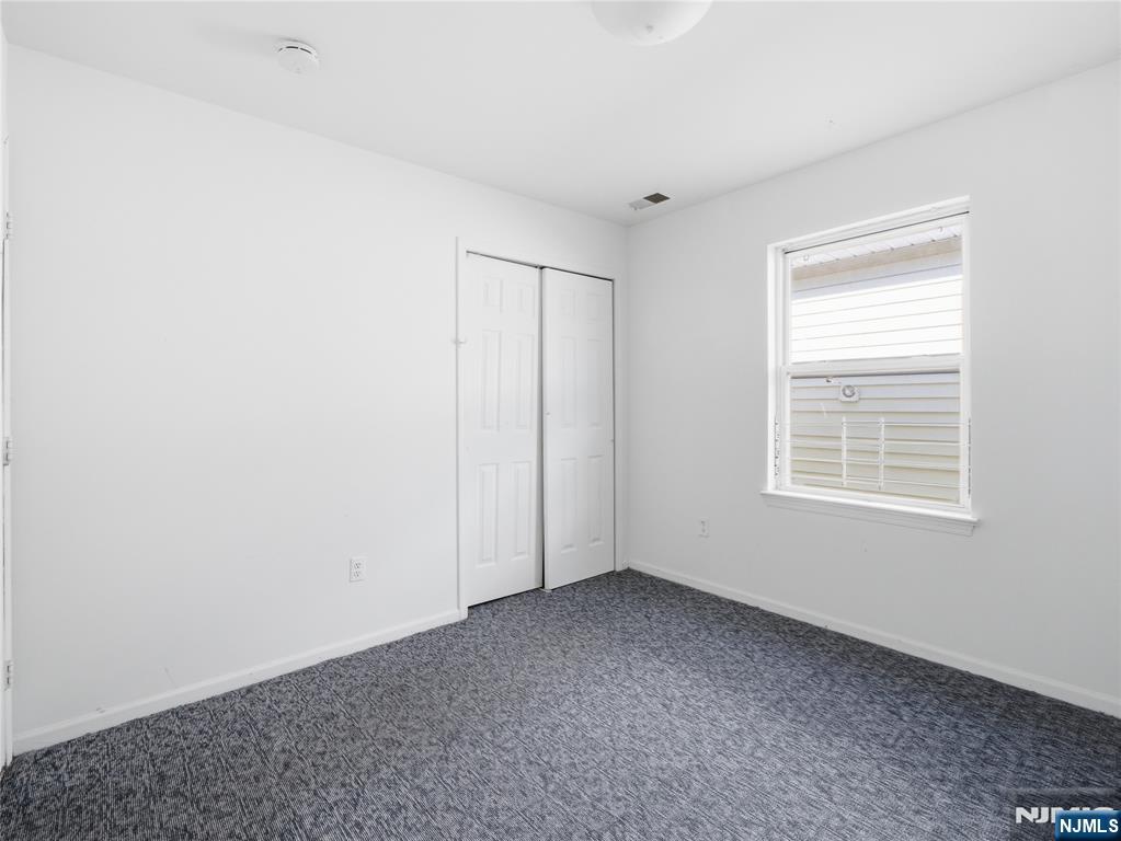 55 Lincoln Avenue, Unit 2 Newark, NJ 07104 - Photo 14 of 21 a view of an empty room with a window