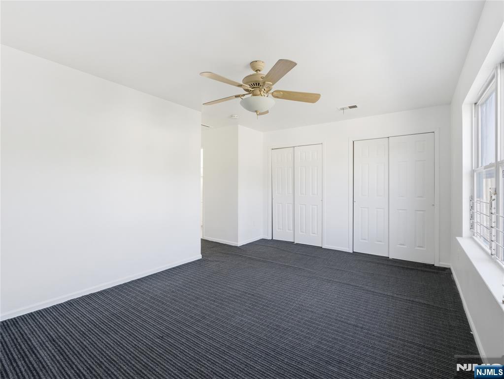 55 Lincoln Avenue, Unit 2 Newark, NJ 07104 - Photo 18 of 21 a view of an empty room with a window