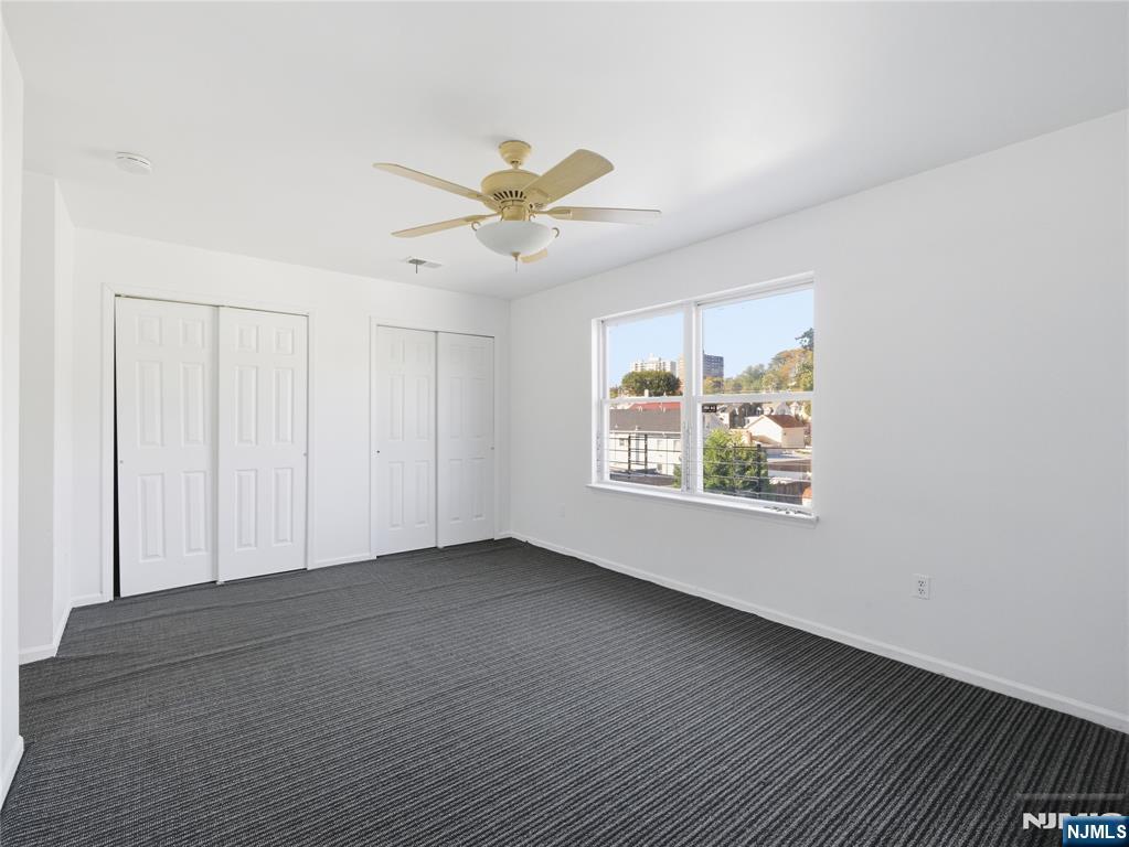 55 Lincoln Avenue, Unit 2 Newark, NJ 07104 - Photo 19 of 21 a view of an empty room with a window