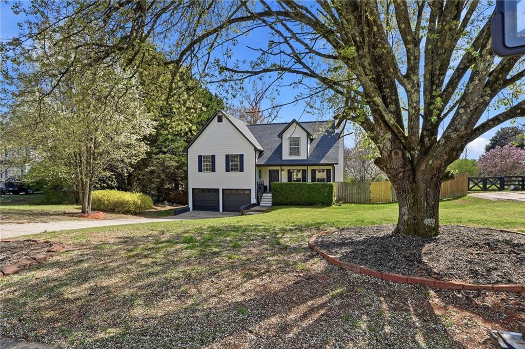 a house with trees in front of it