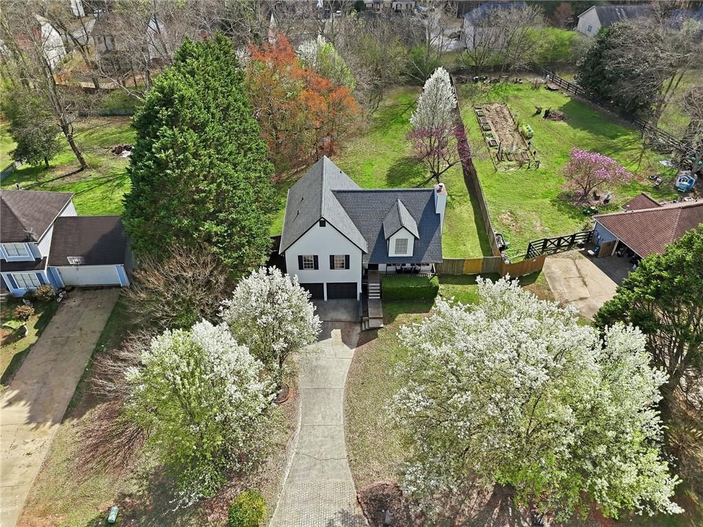8020 Estee Drive Cumming, GA 30028 - Photo 2 of 41 an aerial view of a house